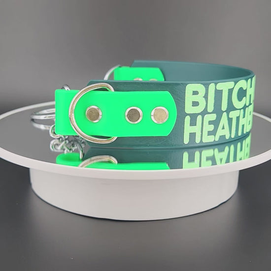 1.5 inch dark green and light green tapered biothane chain martingale dog collar with bitch by birth heathen by choice text in light green glitter