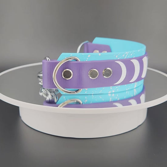 1.5 inch wide light blue and dark purple layered biothane chain martingale dog collar with moon phases and splatter paint for stars