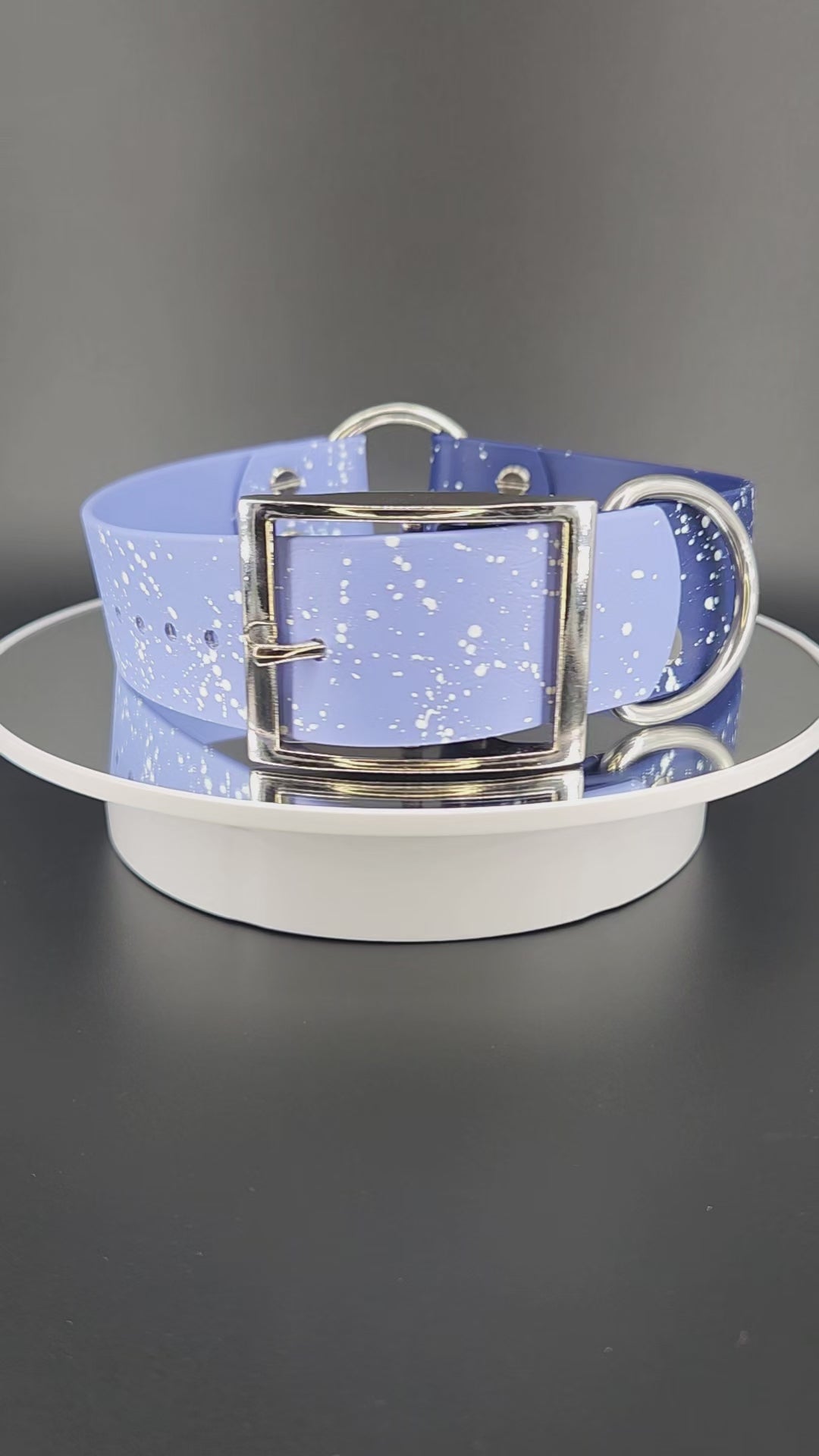 navy and periwinkle blue biothane collar with tag ring and white splatter paint that looks like stars or a galaxy celestial theme collar