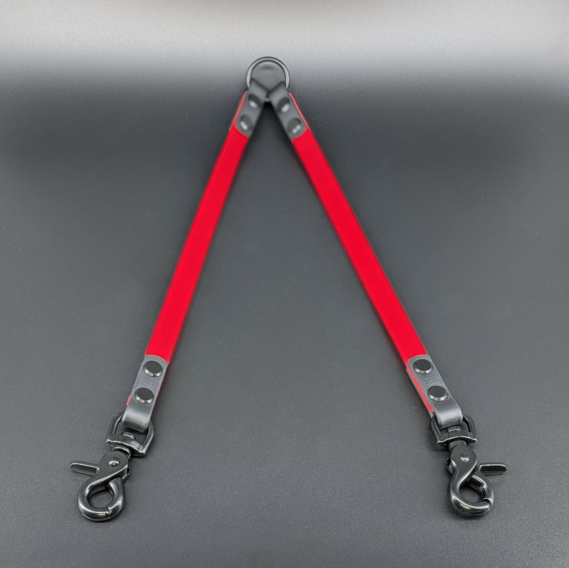 red and black biothane dog leash coupler