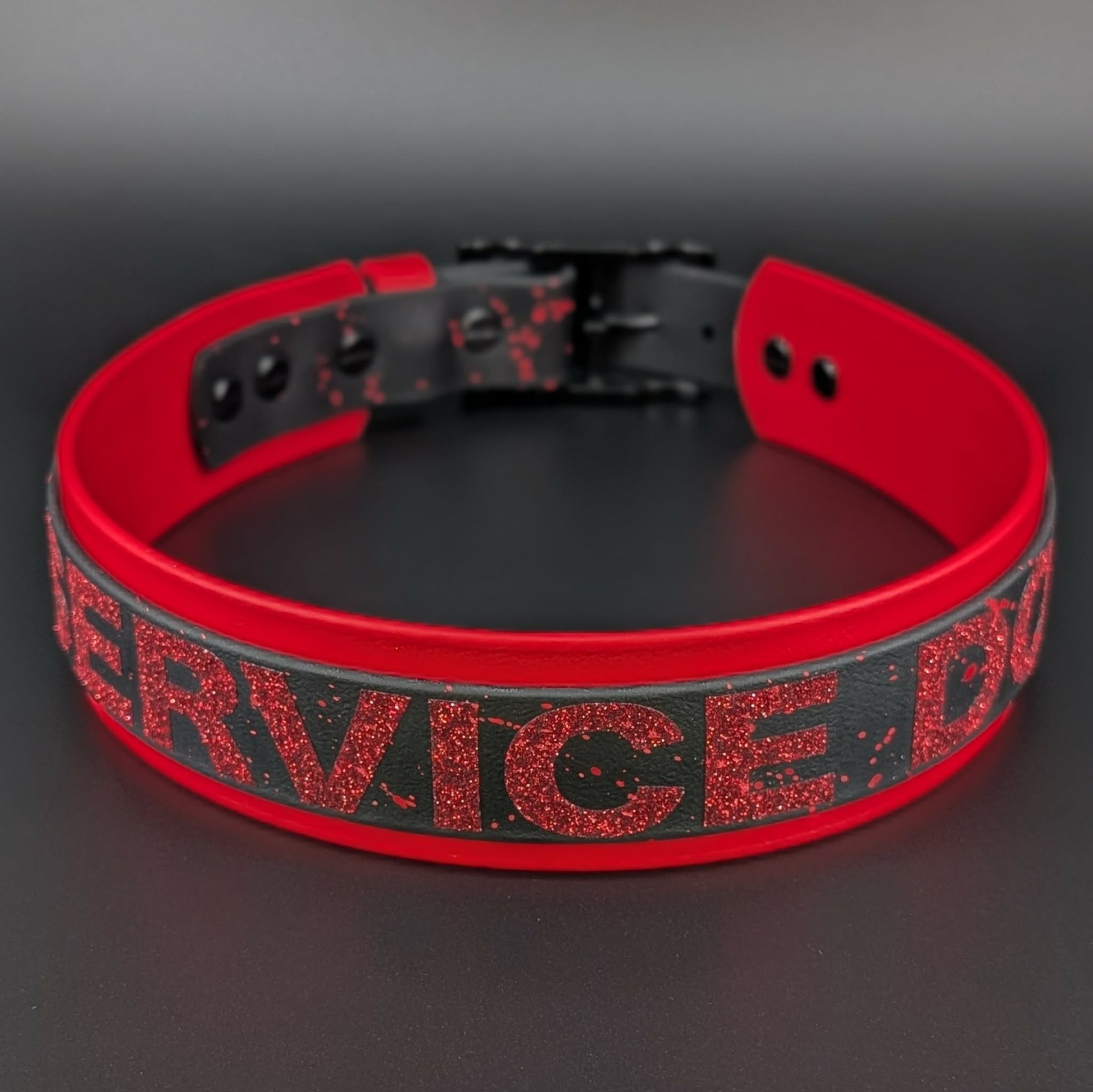 red and black layered biothane service dog collar with red splatter paint