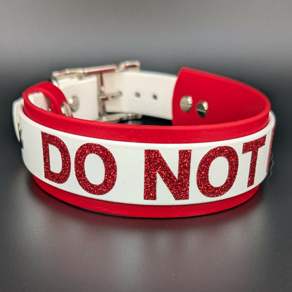Red and white layered biothane dog collar with 'DO NOT PET' text