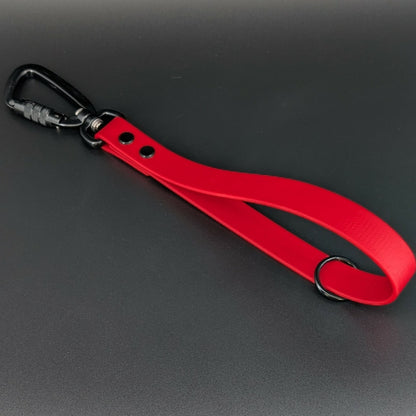 red biothane traffic handle with black carabiner clip and o ring