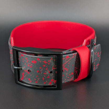 red splatter paint on red and black biothane collar