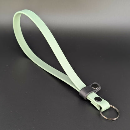 sage green and black biothane wrist strap for e-collar remote