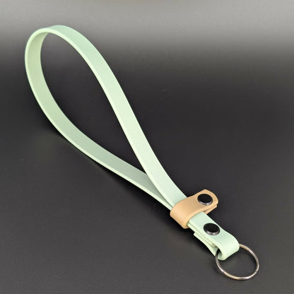 sage green and tan biothane wrist strap for e-collar remote