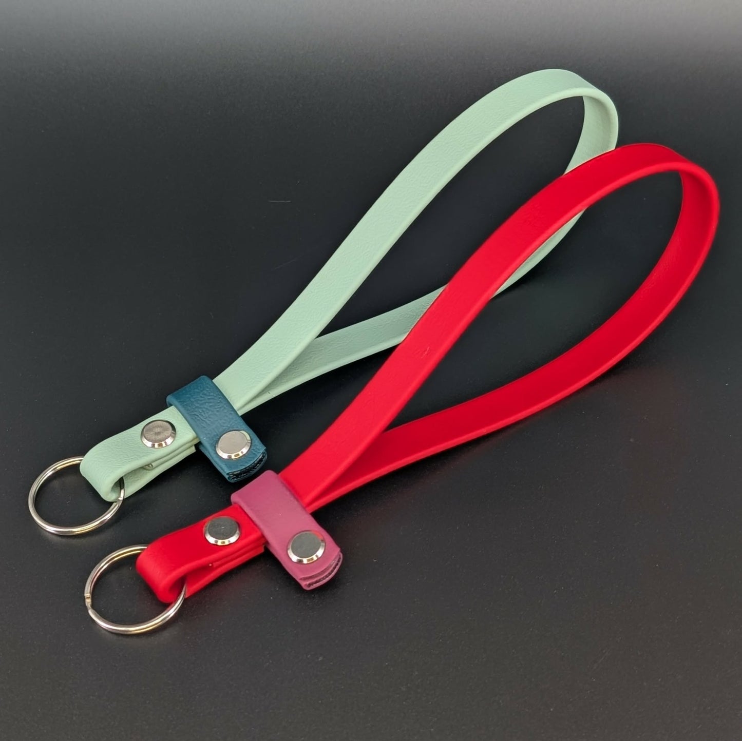 sage with dark green and red with wine biothane wrist straps for e-collar remotes