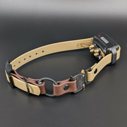 tan and dark brown biothane e-collar strap with bungee and black quick release cobra buckle on a mini educator et-300 with winged contact points for dog training