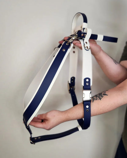 white and navy blue layered biothane y front service dog harness with counterbalance handle and pull strap