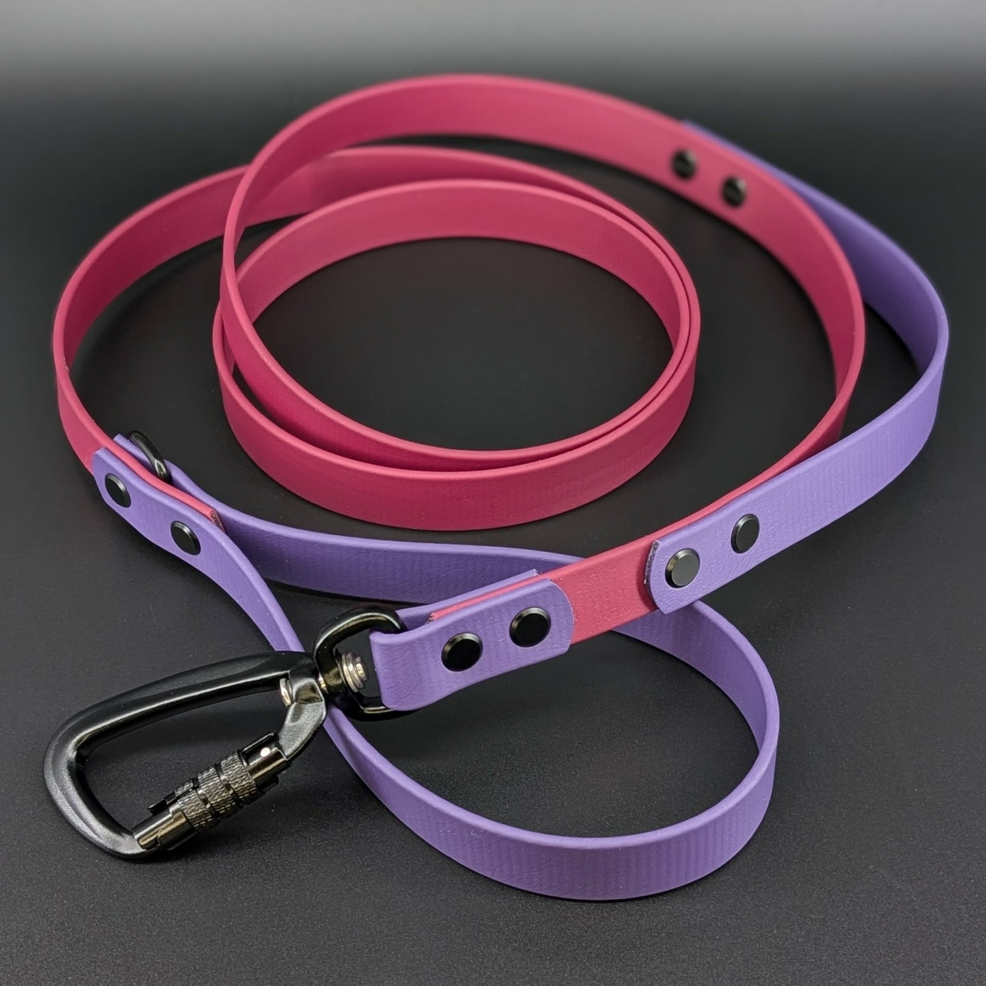 wine and dark purple biothane dog leash with traffic handle and auto locking carabiner clip that twists to unlock and open