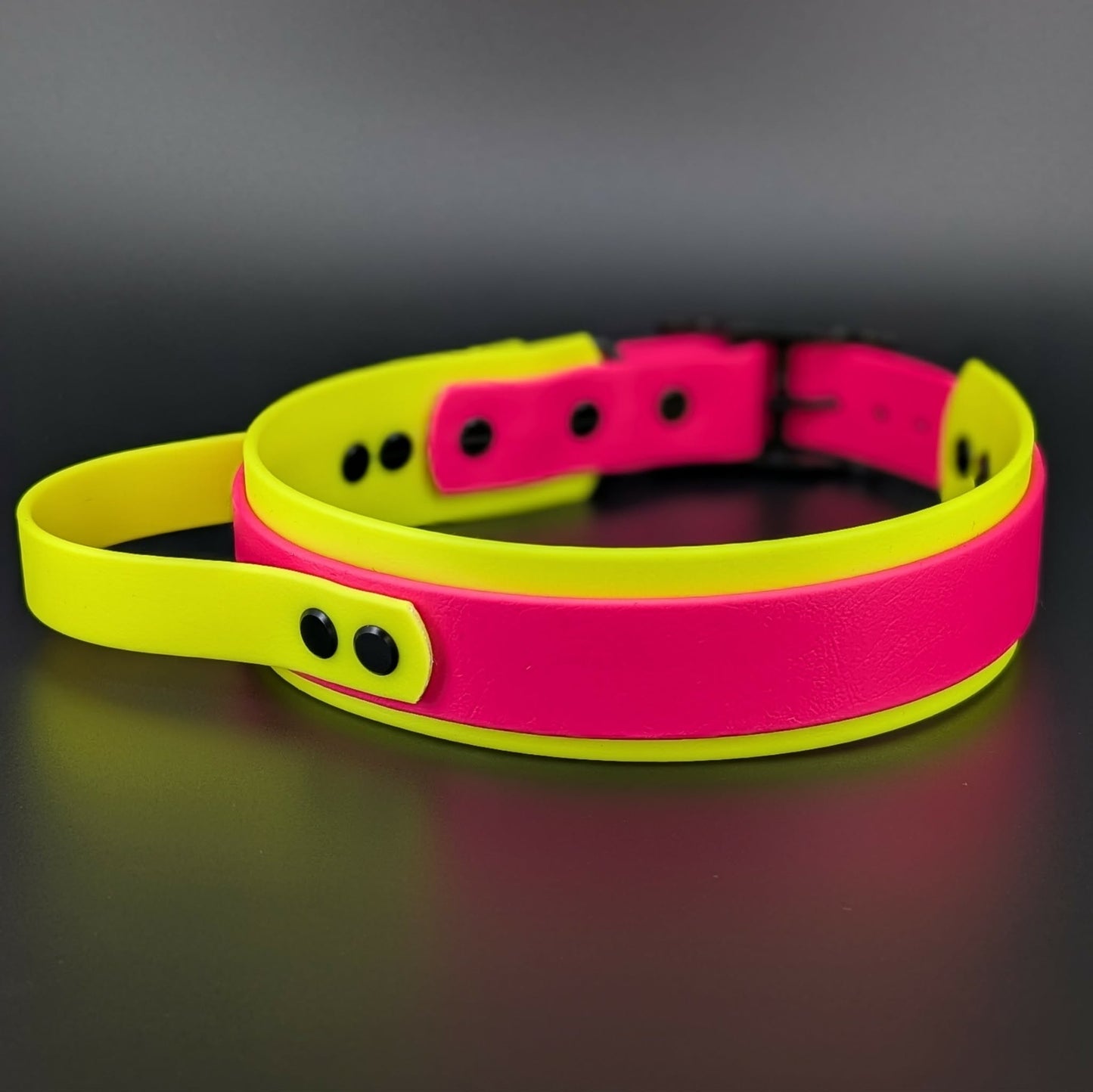 yellow and pink layered biothane dog collar with tactical handle