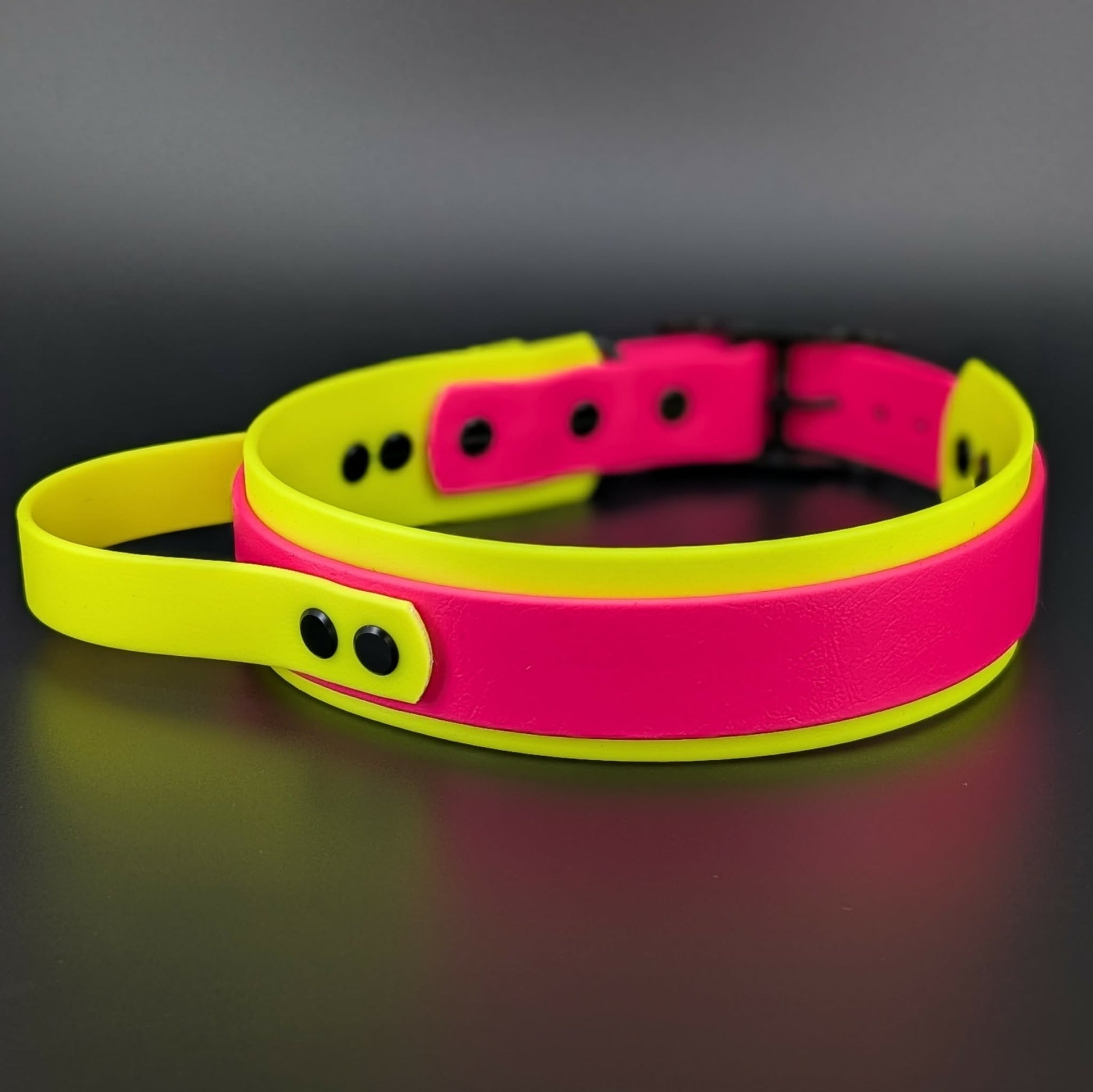 yellow and pink layered biothane dog collar with tactical handle