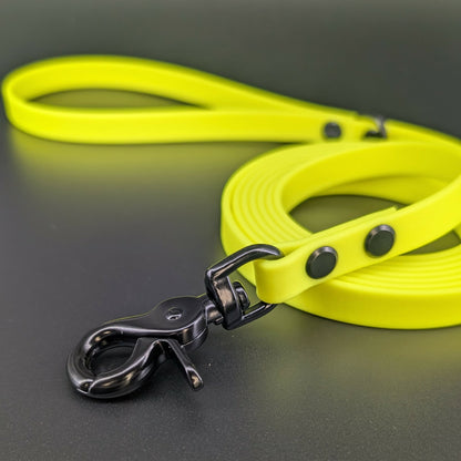 yellow biothane dog leash with black trigger snap