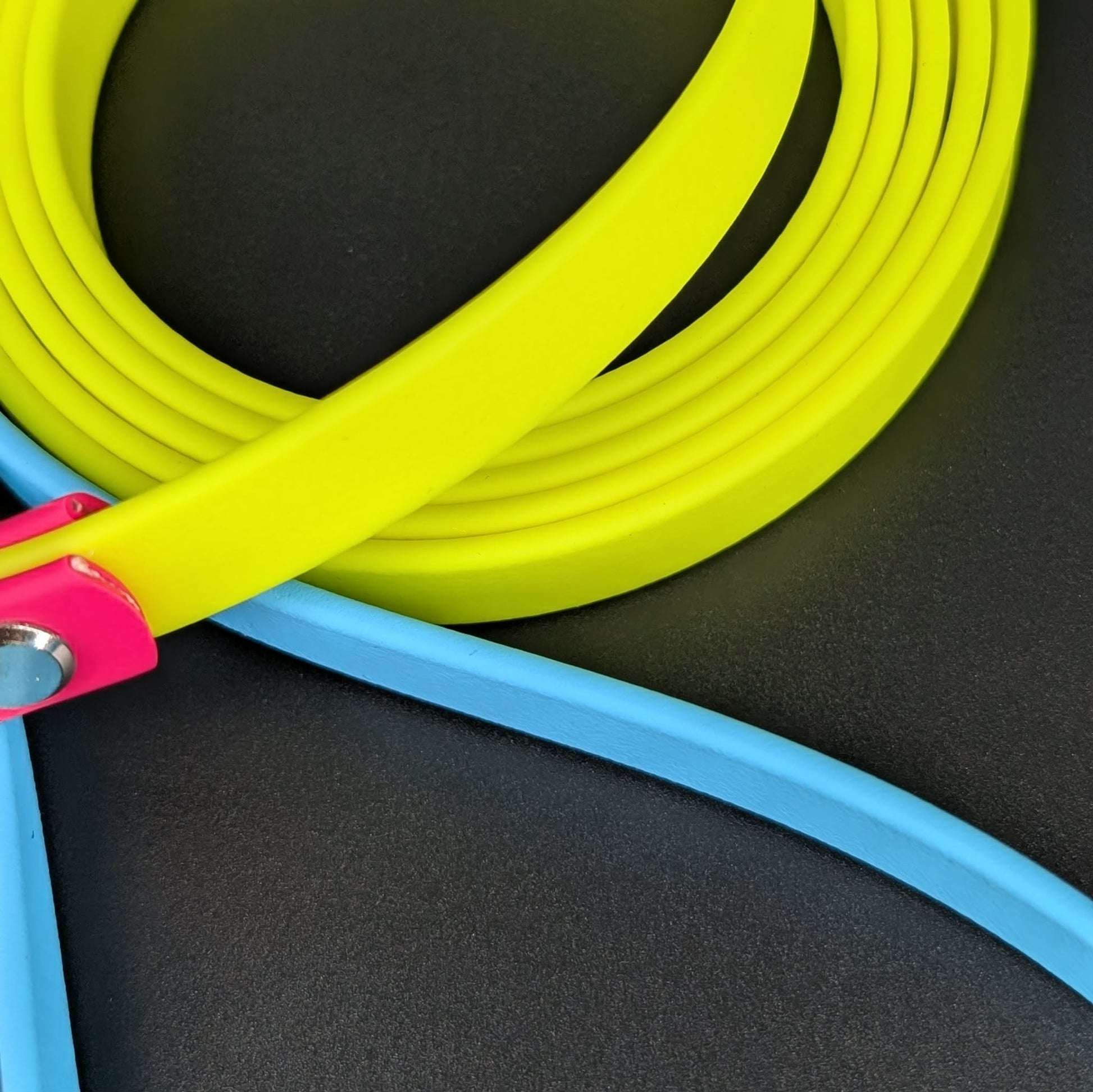 yellow biothane dog leash with pink and blue accents