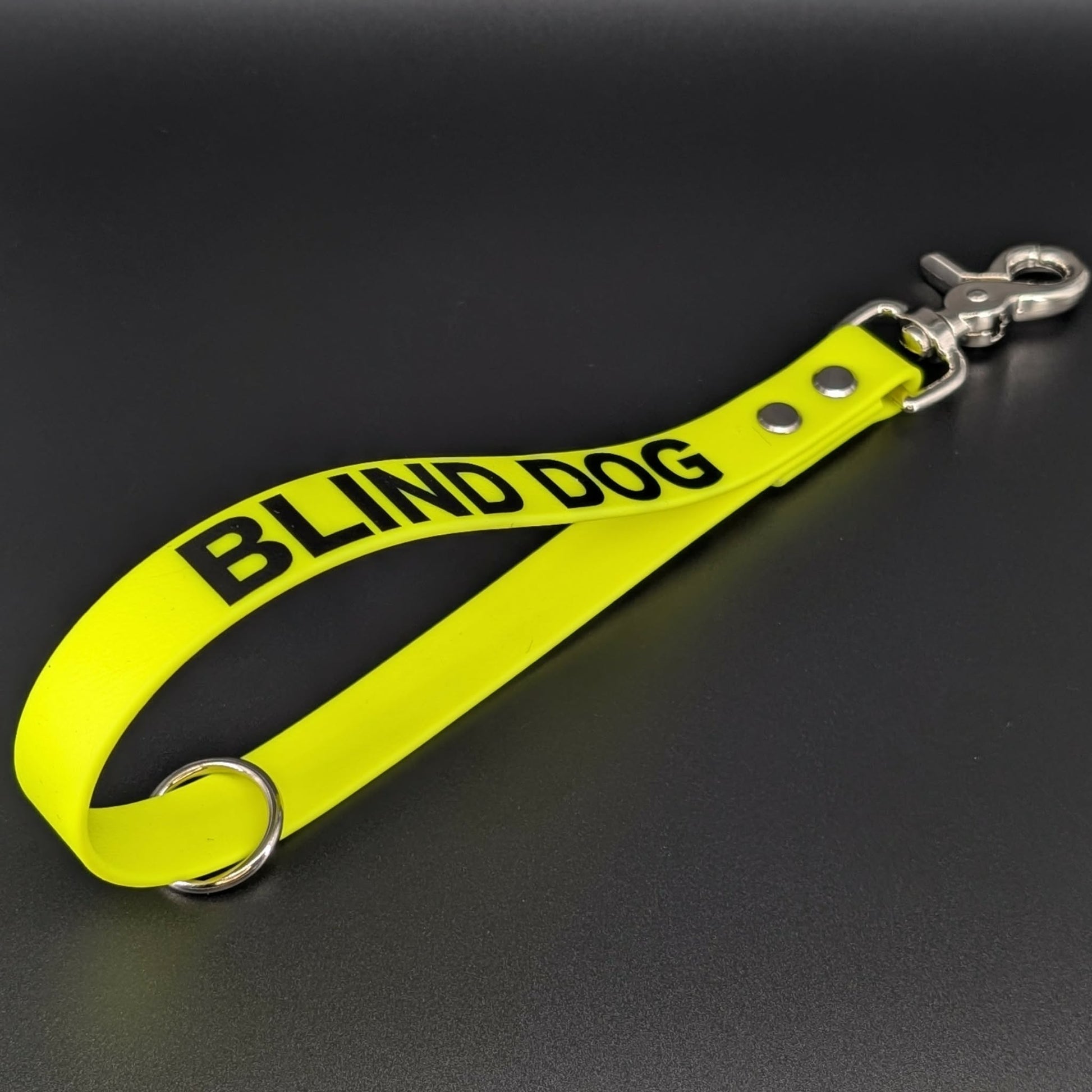 yellow biothane traffic handle with custom text reading blind dog
